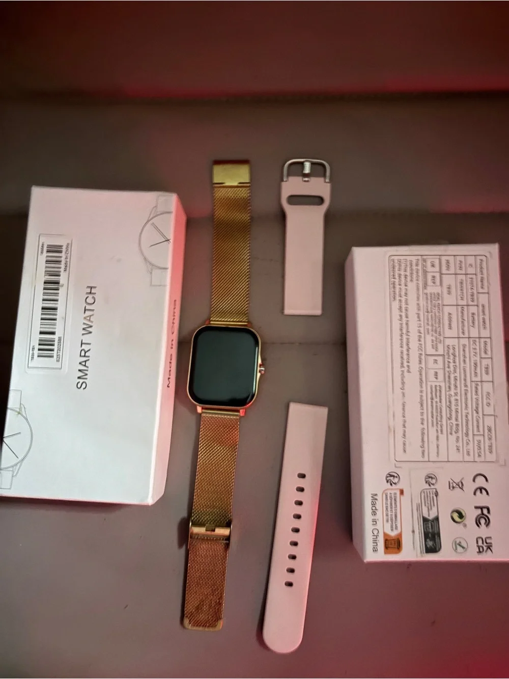 Gold Smart Watch with Interchangeable Pink Bands
